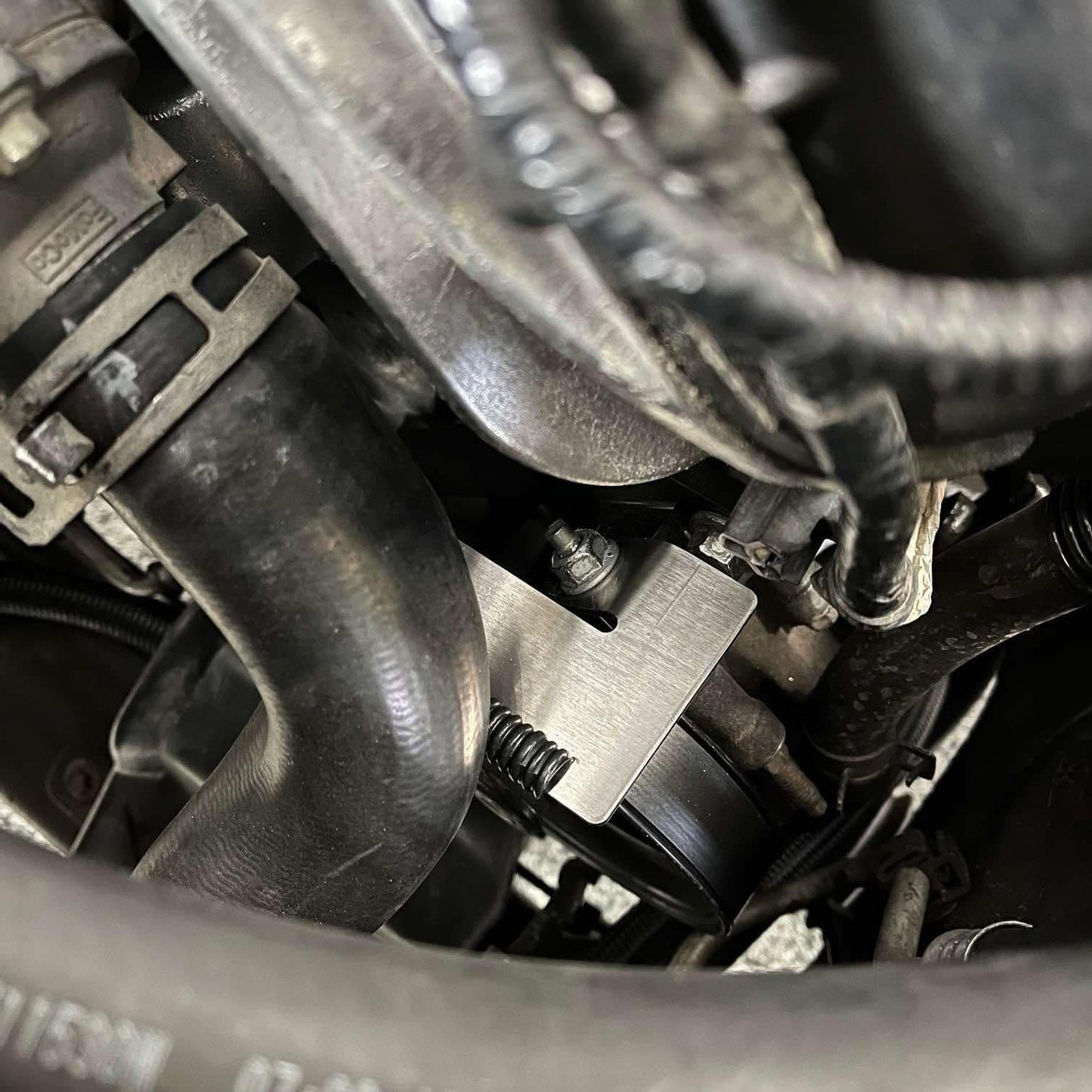 Coyote Swap Lower Radiator Hose Deflector Bracket -